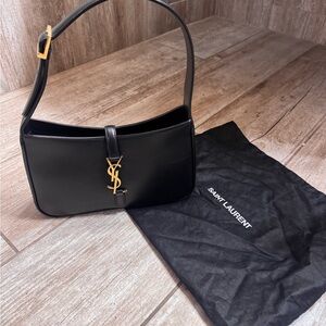 Saint Laurent Black Leather Bag with Gold Logo